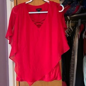 Asymmetrical poncho style blouse